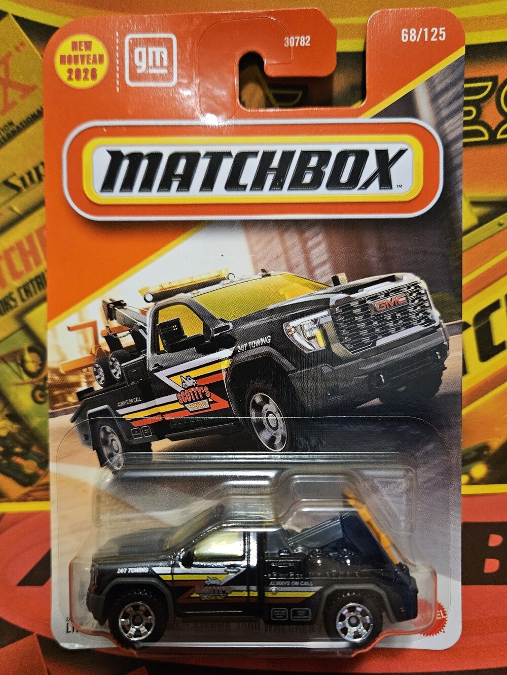 Matchbox GMC Sierra 3500 HD Black and Yellow Tow Truck Collector Edition.